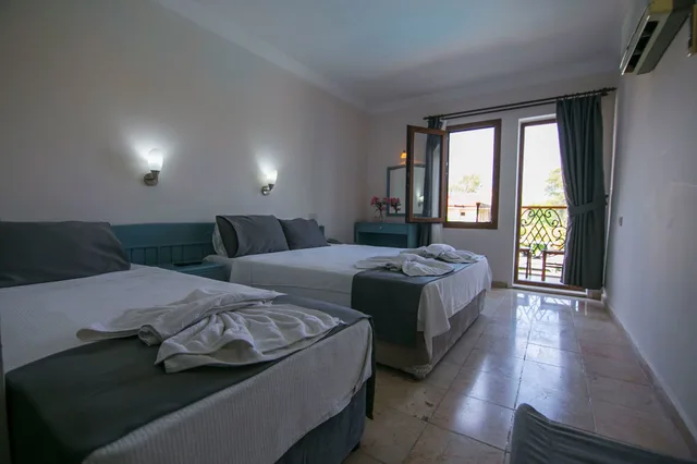غرفة قياسية ثلاثية بسرير كوين وسرير فردي، Kilim Hotel 2/10