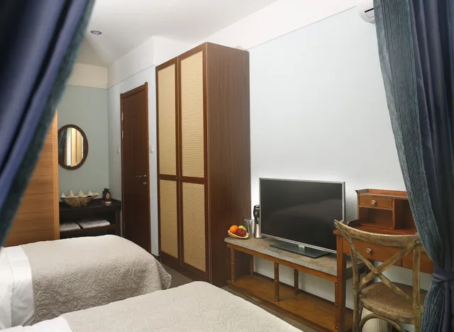 غرفة قياسية بسرير كينج، Shell Villa Apartel Resort 3/5