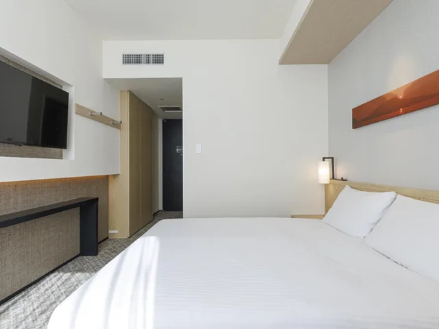 غرفة بسرير كينج وسرير كوين، JR Kyushu Hotel Blossom Shinjuku 2/5