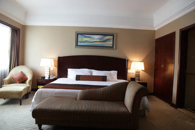 غرفة تنفيذية بسرير كينج، GRAND INTERNATIONAL HOTEL 4/7