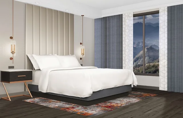 جناح استوديو بسرير كينج بشرفة مع أريكة بحوض استحمام، Embassy Suites by Hilton Pigeon Forge Resort 1/7