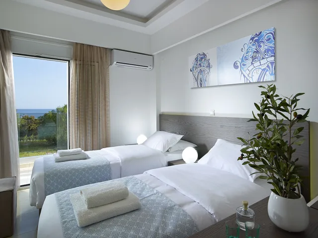 شقة بسريرين منفصلين وسرير كينج بإطلالة على البحر بشرفة بغرفتي نوم، Coral Apartments 3/4