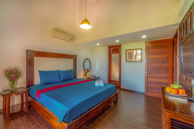 غرفة عائلية رباعية بسريرين كوين، Golden Peach Villa Hoi An 1/4