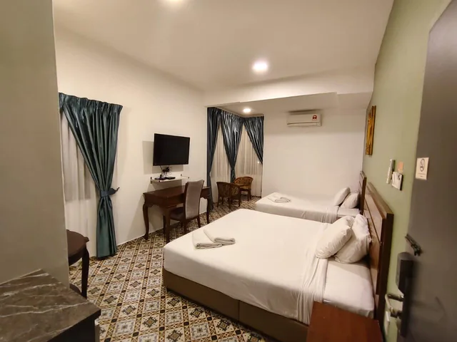 غرفة تنفيذية رباعية، Pearl Inn 1/1