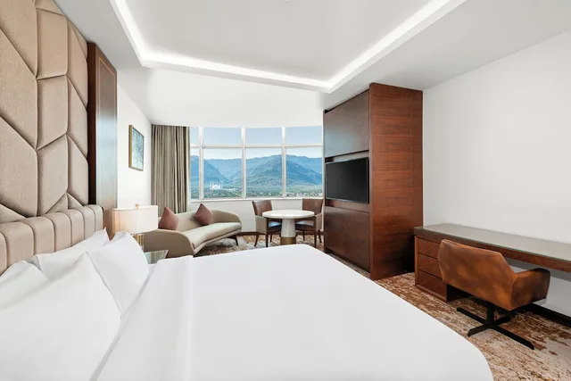 غرفة ديلوكس بسرير كينج، Movenpick Hotel Centaurus 1/9