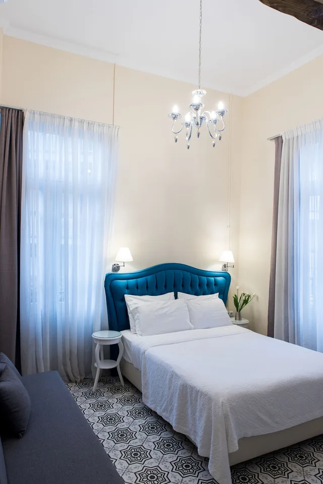 غرفة سوبيريور بسرير كوين مع أريكة، Old Town Inn 1/4