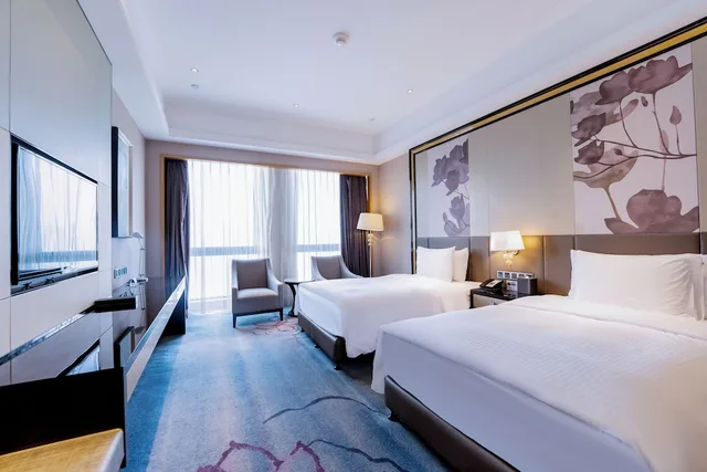 غرفة ديلوكس بسريرين منفصلين، Wanda Realm Guangzhou Zengcheng 1/6