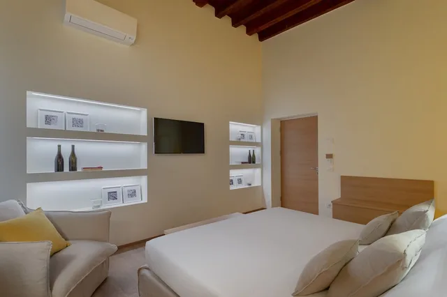 جناح سوبيريور بسرير كوين مع أريكة، Massimago Wine Suites 2/2