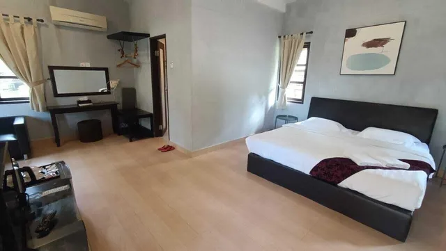 غرفة ديلوكس بسرير كينج بشرفة بغرفة نوم واحدة، Sentosa Villa 1/3