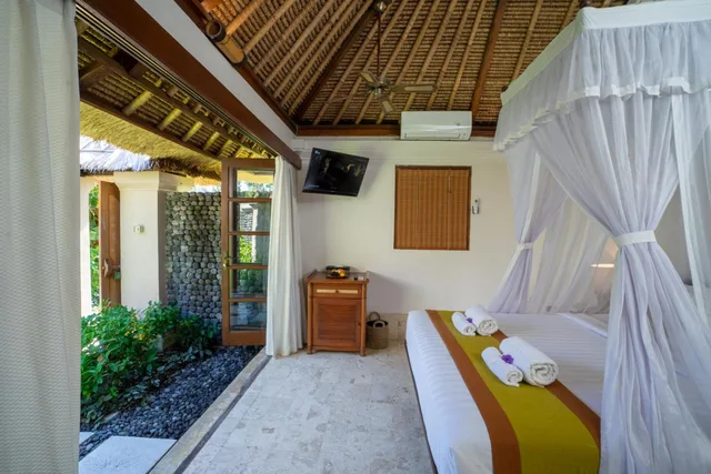 فيلا بسرير كينج بإطلالة على الفناء، Mimpi Resort Tulamben 1/3