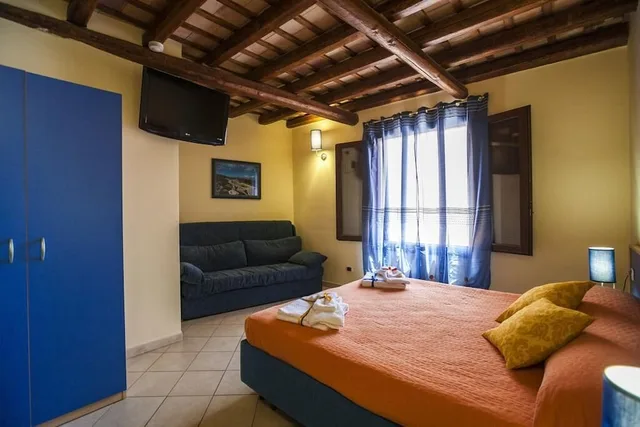 شقة عائلية بسريرين مزدوجين بغرفتي نوم مع أريكة، Residence Cortile Merce 4/8