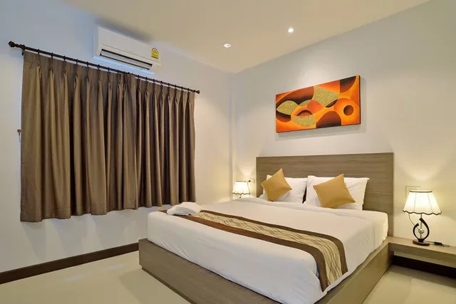 غرفة قياسية بسرير كوين، The Rich Resort 2/4