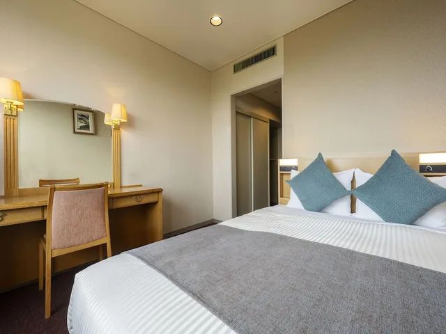 غرفة بسرير مزدوج بحمام خاص، Kamenoi Hotel Fukui 1/3