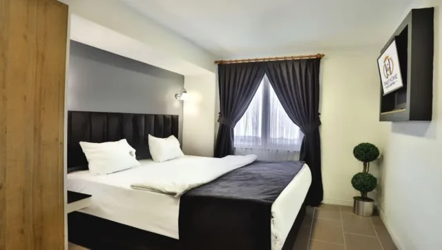 جناح كومفورت بسريرين منفصلين وسرير كينج بإطلالة على البحر بغرفتي نوم، Sweet Home Suite Hotel 6/9
