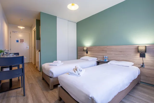 غرفة بسريرين منفصلين، Comfort Aparthotel Le Mans 2/6