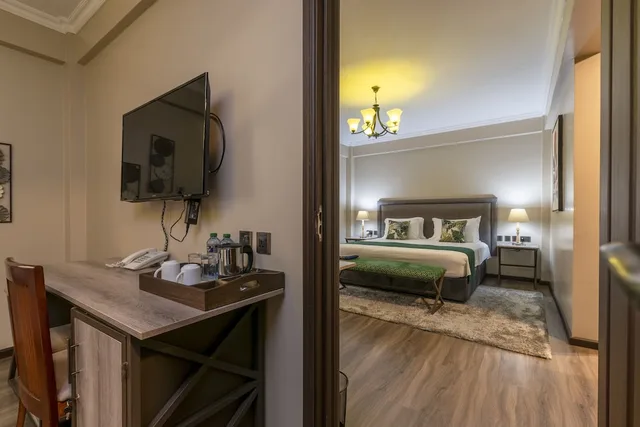 غرفة عائلية بسرير كينج وسرير فردي، Fair Acres Boutique Hotel 3/3