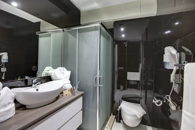 غرفة تنفيذية بسريرين منفصلين مع أريكة، Fourteen Luxury Boutique Hotel Spa 6/6
