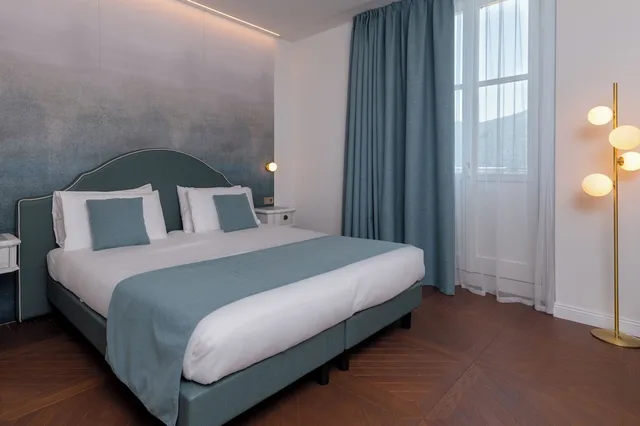 غرفة ديلوكس بسرير مزدوج بإطلالة على البحيرة، Grand Hotel Menaggio 1/10