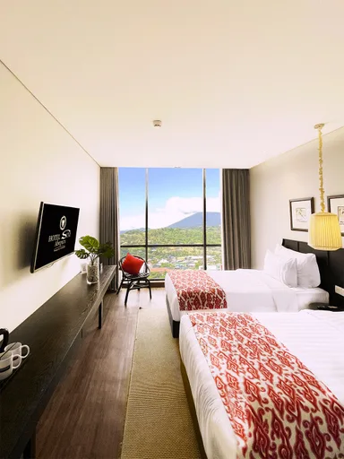 غرفة ديلوكس بسريرين منفصلين للمدخنين، Hotel Suni Abepura 1/2