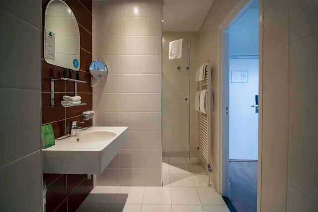 غرفة غراند ديلوكس بسرير كوين، Grand Hotel De Draak and Residence Dagmara 6/6