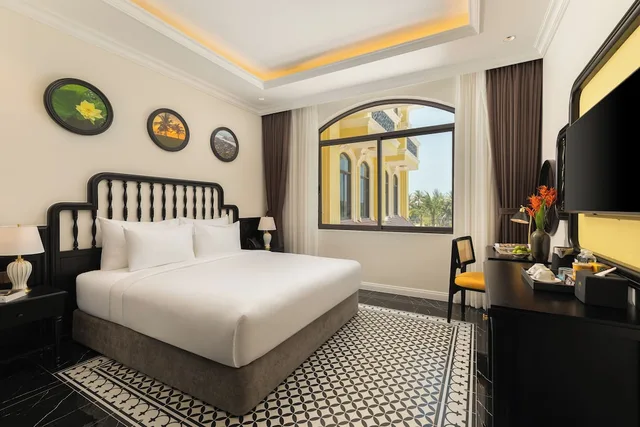 غرفة ديلوكس بسرير كينج، Nesta Hoi An Resort and Spa 4/9