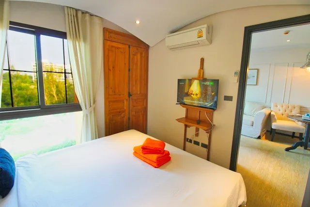 غرفة ديلوكس بسرير كوين بإطلالة على المسبح، Venetian Resort Jomtien 3/10