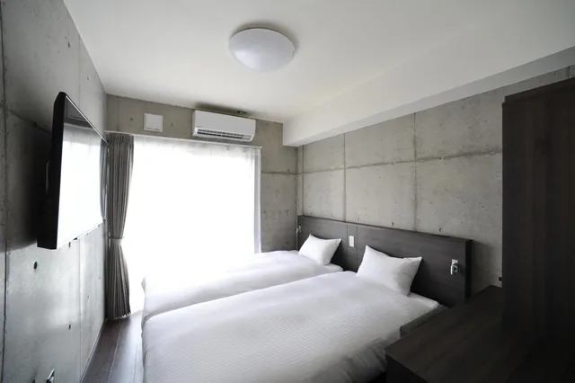 Adjoining, Twin Beds، The Breakfast Hotel Porto Ishigaki 1/10