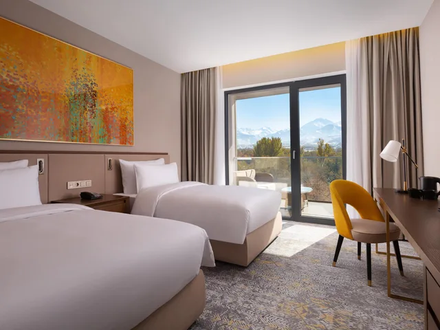 غرفة كلاسيكية بسريرين منفصلين، Swissotel Wellness Resort Alatau Almaty 1/10