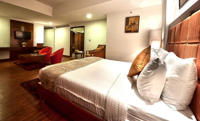 غرفة بريميوم بسرير مزدوج وسرير فردي، The Golden Plaza Hotel Spa 1/2