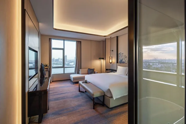 جناح ديلوكس بسرير كينج بإطلالة على المدينة مع دخول الصالة، Pullman Suzhou Taicang 3/4