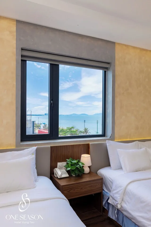 غرفة غراند رباعية بسريرين كوين بإطلالة على المدينة بغرفة نوم واحدة، Ngoc Hanh Beach Hotel 5/6