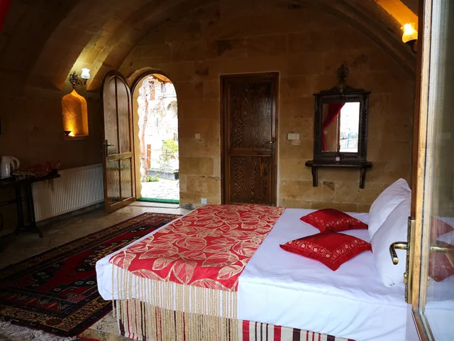 غرفة ديلوكس بسرير كوين بشرفة، Roc Of Cappadocia 4/4