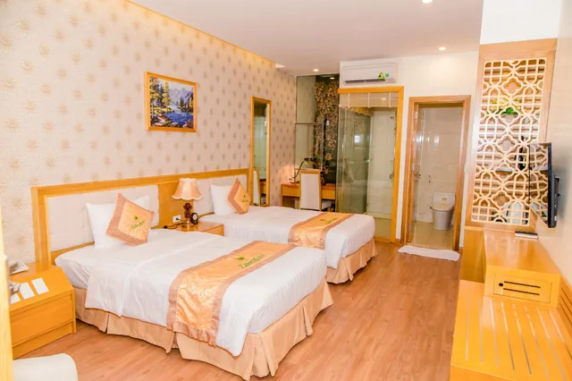غرفة ديلوكس بأربعة أسرّة وسريرين منفصلين، Palm Hotel Thanh Hoa 2/2