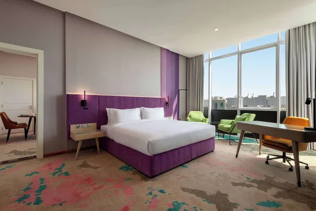 Suite, King Bed, City View, Smoking, La Quinta by Wyndham Abu Dhabi Al Wahda 1/2