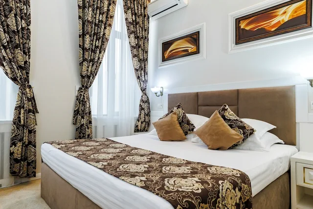 غرفة بسرير كينج، La Strada Boutique Villa 1/10