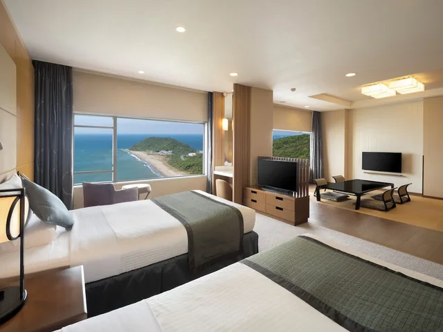 غرفة يابانية غربية ديلوكس بسريرين منفصلين وفرشتي فوتون مع أريكة، Irago Ocean Resort 1/2