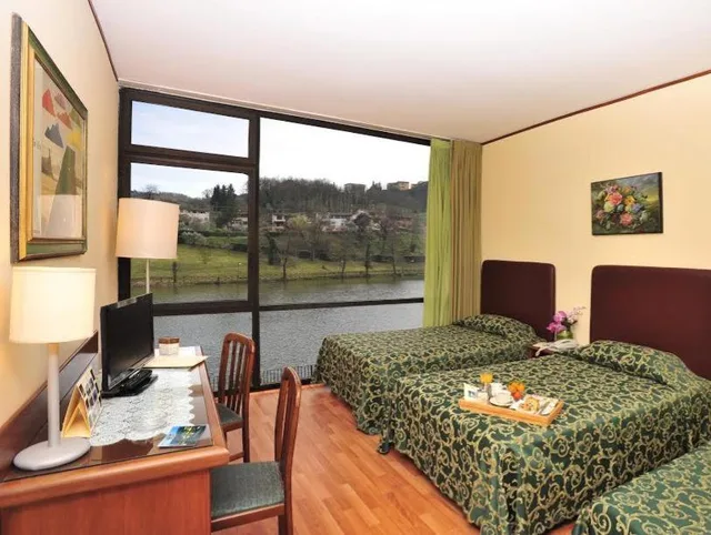 غرفة بسرير مزدوج أو سريرين منفصلين بإطلالة على البحيرة، Hotel Lago Verde 2/6