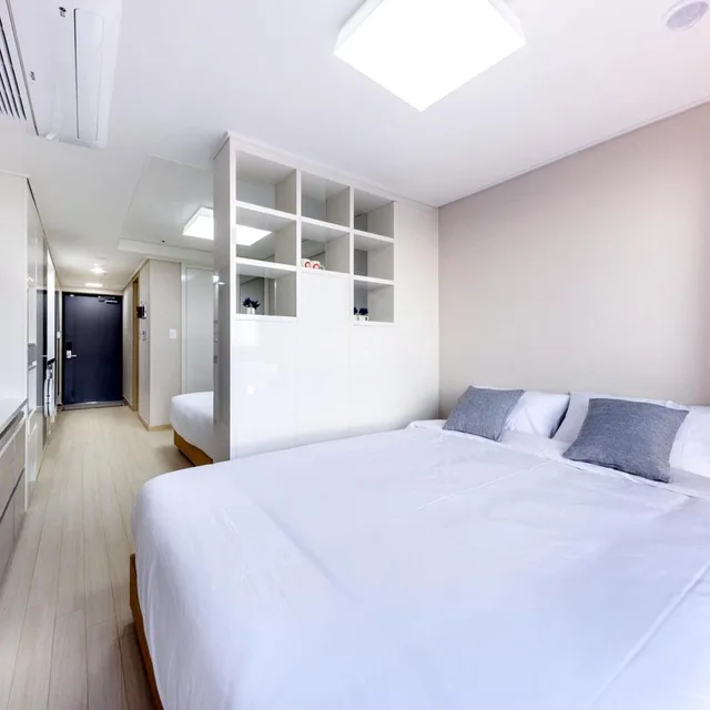 غرفة عائلية بسريرين منفصلين بإطلالة على البحر، Shin Shin Hotel Seogwipo 3/10