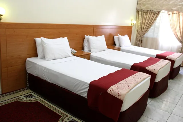 غرفة كلاسيكية رباعية بسرير فردي، Al Ahrar Hotel 1/6