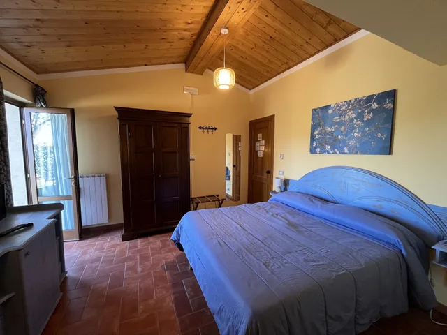 غرفة بسرير كوين، Agriturismo Poggio Del Drago 1/10