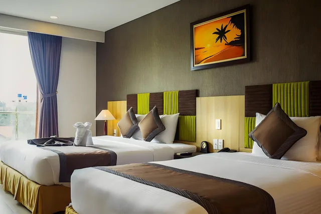 غرفة ديلوكس ثلاثية بسرير فردي، Muong Thanh Mui Ne Hotel 1/1