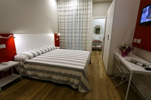 غرفة سوبيريور ثلاثية بسرير مزدوج وسرير فردي، Hotel Aurea 1/6
