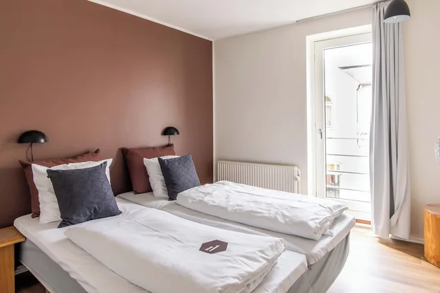 شقة بأربعة أسرّة وسرير مزدوج وسرير بطابقين بإطلالة على الفناء بغرفتي نوم، Kolding Hotel Apartments 3/8
