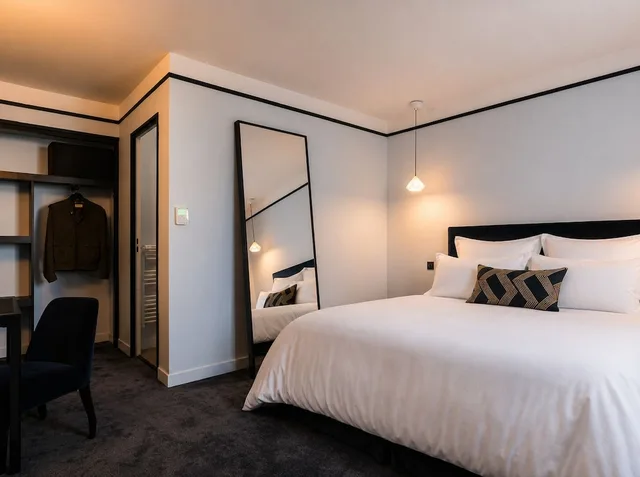 غرفة ديلوكس بسرير كوين بإطلالة على الحديقة، L Hotel 1/4