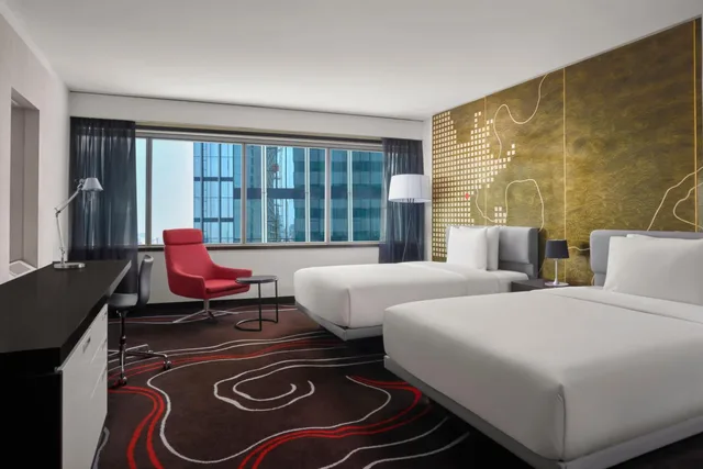 غرفة بسريرين مزدوجين مع دخول صالة النادي، Le Meridien Saigon 3/4