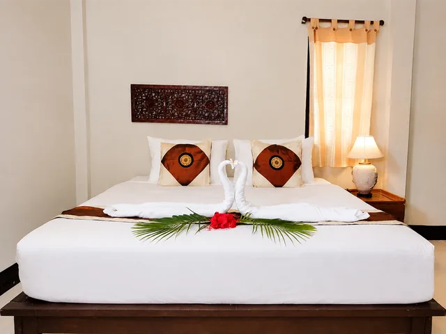 غرفة قياسية بسرير مزدوج بإطلالة على الحديقة، Phuwadee Resort And Spa 1/2