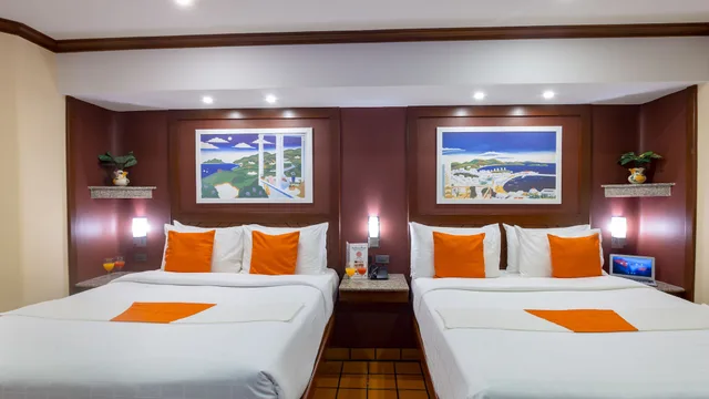 غرفة ديلوكس بسرير كوين وسرير فردي، Pacific Club Resort 2/10