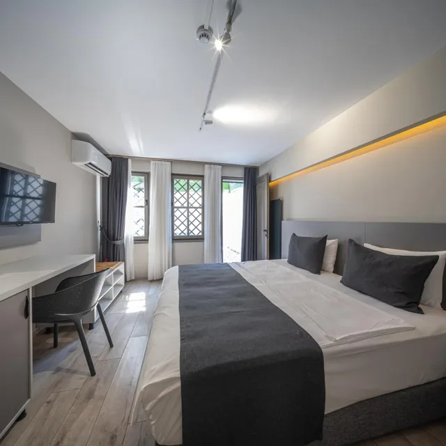 غرفة ديلوكس بسرير مزدوج أو سريرين منفصلين بإطلالة على الحديقة، Calanthe Residence 5/10