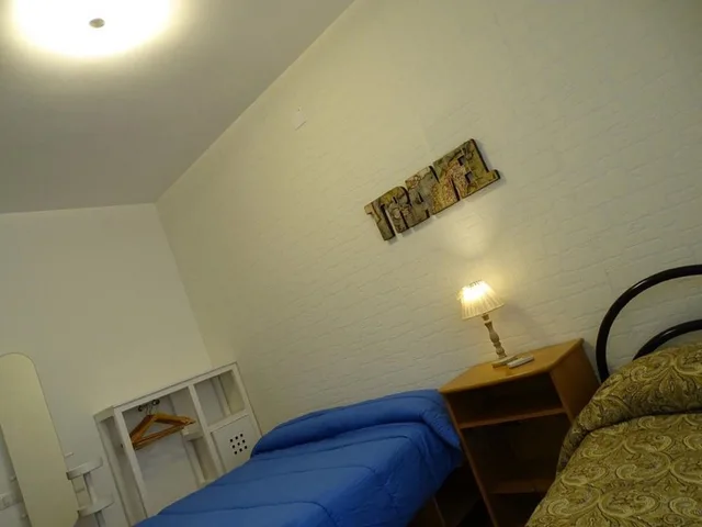 غرفة بسريرين منفصلين بإطلالة على المدينة بحمام مشترك، Casa Papapietro 4/5
