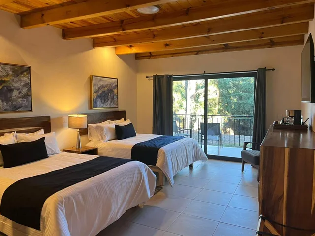 غرفة بسريرين مزدوجين، Bosque Escondido Hotel de Montana 2/6